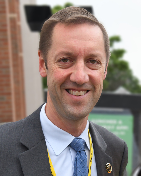 Man with coat and tie