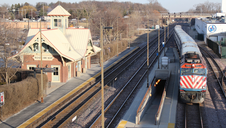 View from bridge of commuter train at station