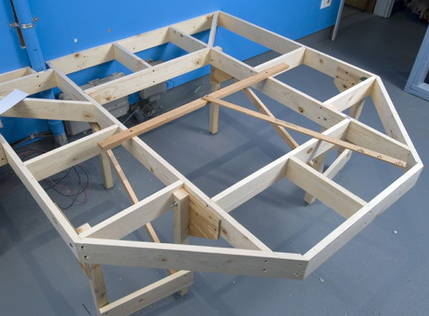 Fig. 2. Jeff’s helix started with a frame of inexpensive 1 x 4 lumber secured to the wall and supported by six 2 x 2 legs.