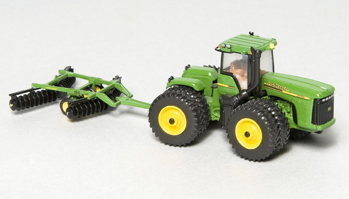 John Deere 9620 tractor and disk implement