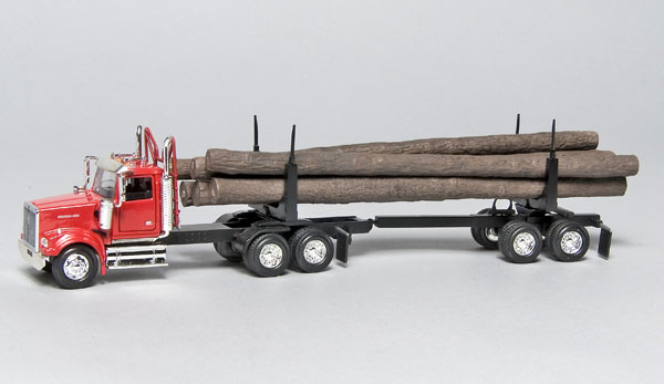 Western Star 4900 EX day-cab log truck with log trailer