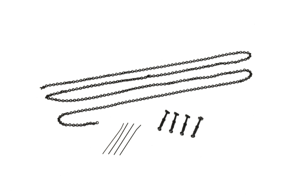The model comes with scale metal chain, plastic load adjusters, and wire attachments to simulate tie-downs that locked into tracks on the deck.