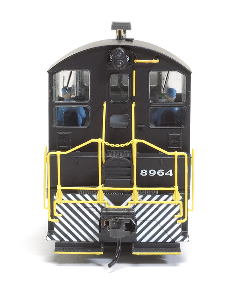 The locomotive features a detailed cab interior with painted figures. The backup light works.