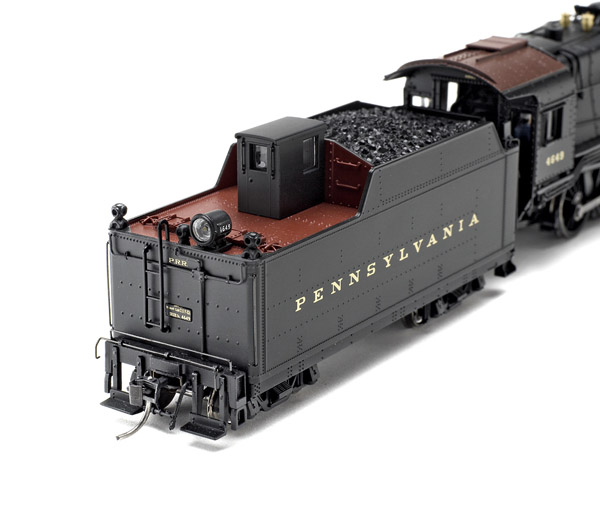 This tender’s coal bunker captures the slight inward taper of the prototype.