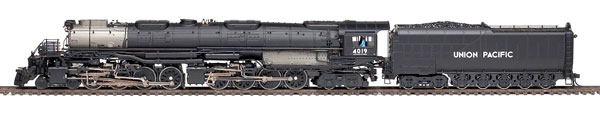 Die-cast metal black and silver steam locomotive.