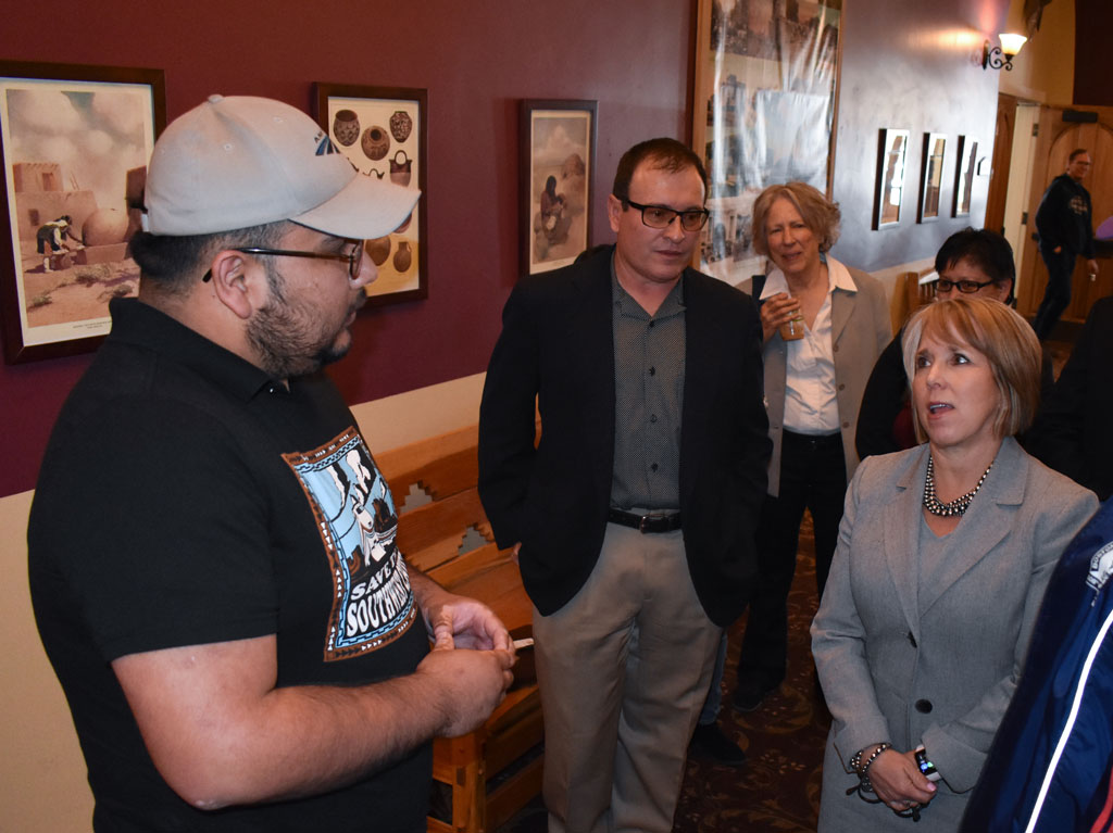 New Mexico Governor Michelle Lujan Grisham and NMRPA president Adrian Gurule discuss Amtrak Southwest Chief Thomas Scalf