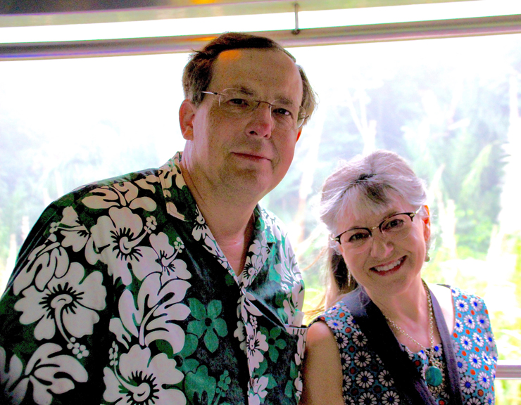 Man and woman on board train