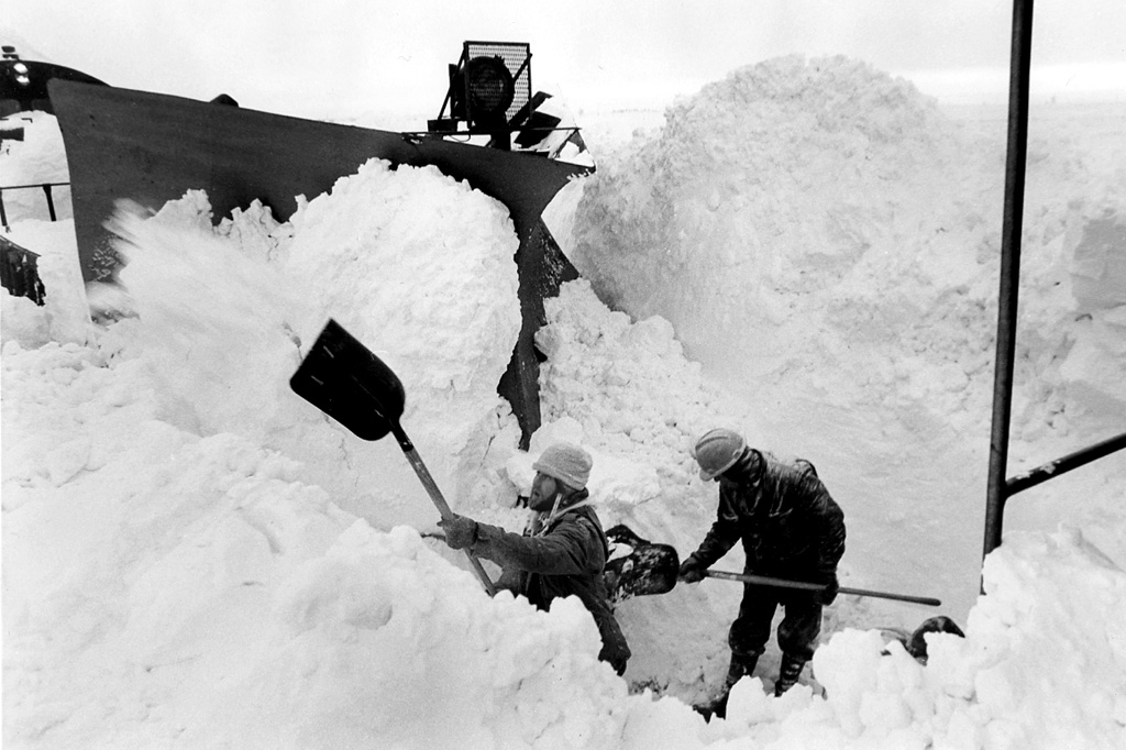Milwaukee Road workers digging out a Wisconsin plow extra