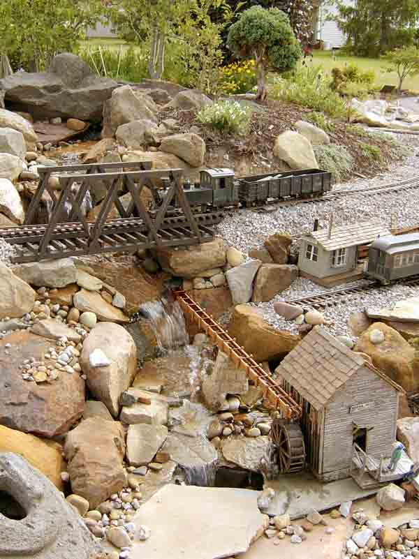 bridge with rocks on garden railway