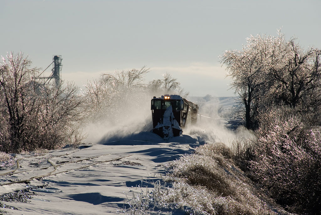 A train plowing through the snow