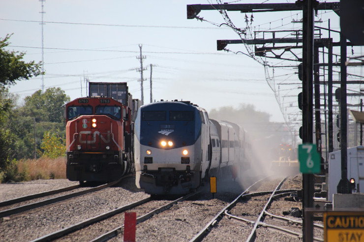 Passenger train passes freight