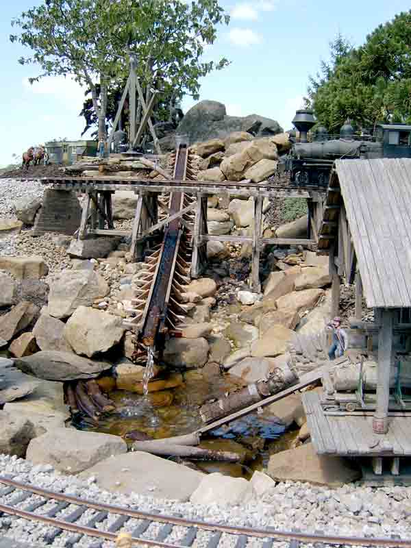 mill pond and log flume on garden railway