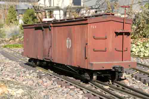 model boxcar on track
