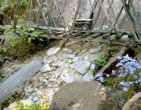 fallen rock on garden railway