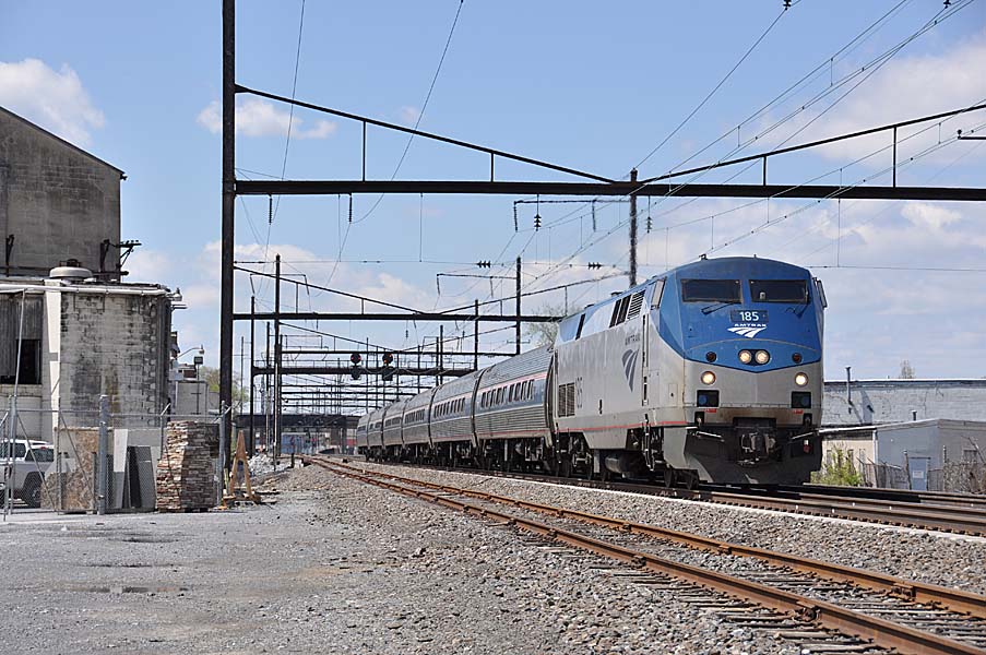 Diesel-powered passenger train operating under electified trackage