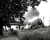 A train passing below a bridge