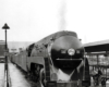 A head on shot of a train sitting at a station