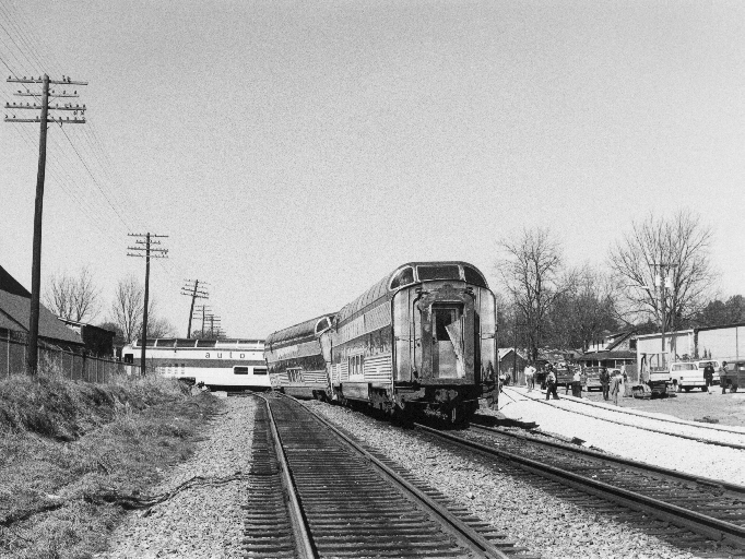black and white photo of train derailment site