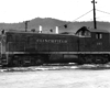 A clinchfield locomotive sitting on the tracks