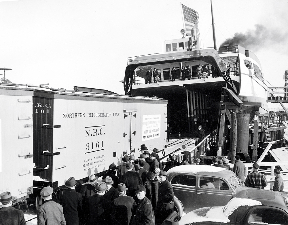 PM’s Lake Michigan carferries were a romantic icon. The S.S. City of Midland 41 loads at Manitowoc on her maiden voyage, March 12, 1941. 