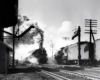A train passing through a water facility 