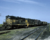 A black and yellow striped train passing by