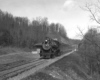 A black and white photo of Clinchfield 4-6-2 No. 154 coming down the tracks
