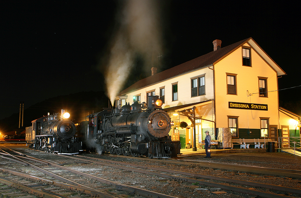 East Broad Top Railroad Mikado-type 2-8-2 locomotives Nos. 12 and 15 appear at the Orbisonia, Pennsylvania, station as part of a nighttime photo shoot in October 2011.