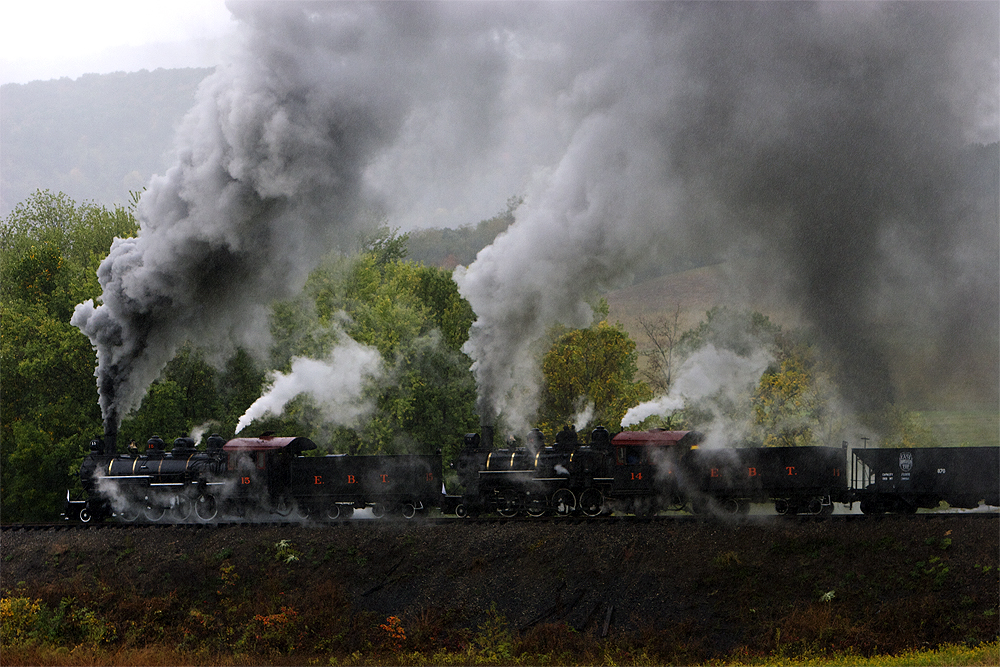 East Broad Top Railroad’s 3-foot gauge Mikado-type 2-8-2 steam locomotives Nos. 15 and 14 are seen on a train near Orbisonia, Pennsylvania, in October 2005.
