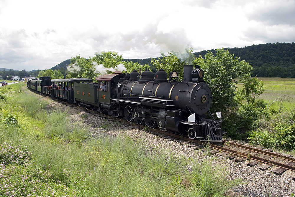 East Broad Top Railroad Mikado No. 15 and its short train head out of Orbisonia, Pennsylvania, June 21, 2009, the 49th year the former coal hauler has been a tourist line.