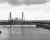 Passenger train on double deck steel lift bridge