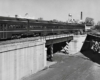 Commuter passenger train on raised right-of-way