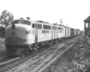 Two-unit diesel locomotive with freight train