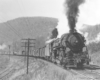 Steam locomotive with freight train on curve