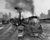 a streamliner engine pulling passenger cars