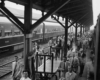 numerous passengers at a passenger station