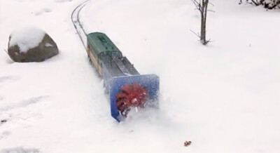 A scratchbuilt rotary snowplow gets to work
