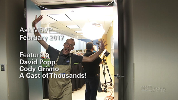 David Popp coming out of the MR&T layout room with his hands in the air and a scary expression on his face.