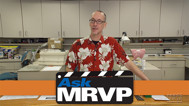 David Popp stands at the counter in the Model Railroader workshop to introduce a video.