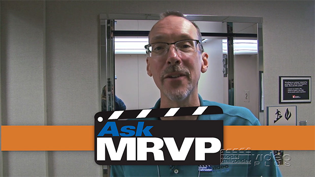 David Popp coming out of an elevator to introduce a video.