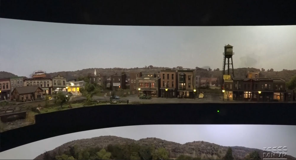 Buildings lit up on an HO scale model railroad