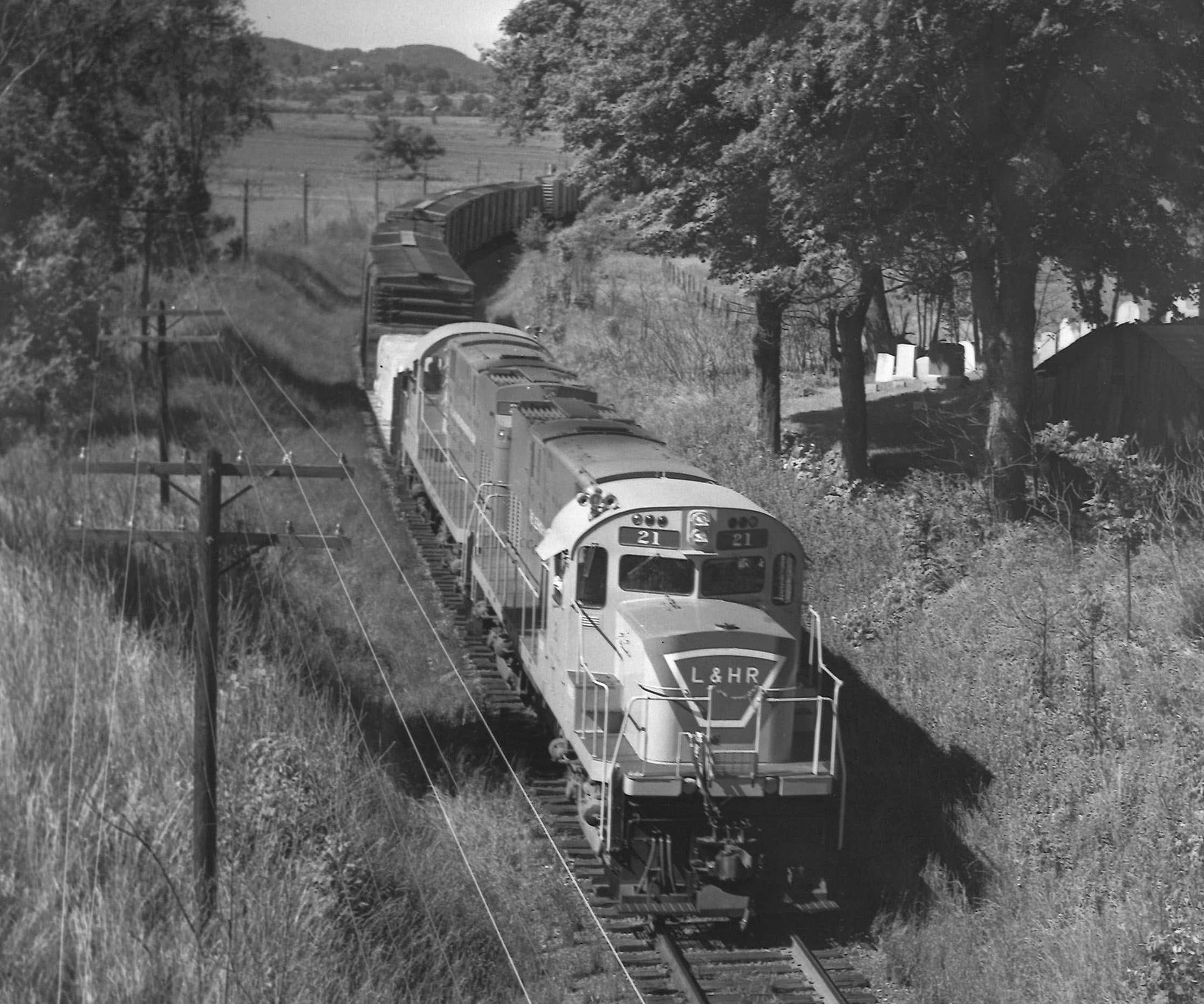 Lehigh & Hudson River diesel locomotives with freight train