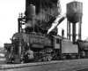 2-8-0 steam locomotive at coal and water facilities