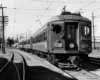 Three cars of an electric passenger train.