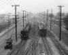 Electric passenger cars operate on a four-track main line.