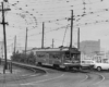 Streetcar about to take a curve toward the photographer.