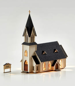 Model church with windows lit up