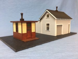 Laser wood kit of a shanty and house