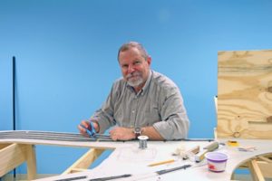 Neil Besougloff working in a studio