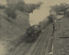 Toronto, Hamilton & Buffalo 4-6-4 steam locomotive with passenger train exiting tunnel